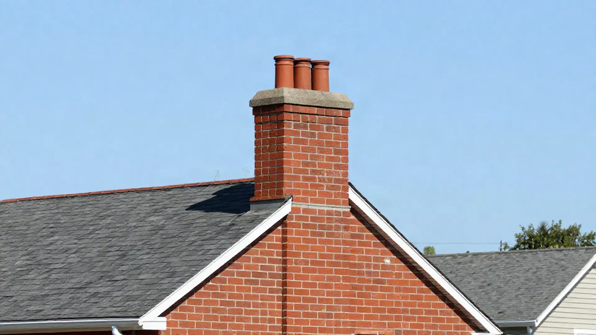 Brick chimney on a home served by Ash Mountain Chimney Sweeps in Philadelphia, PA